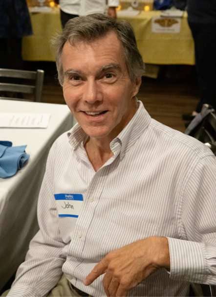 John Swain gives an enticing gaze to the camera.